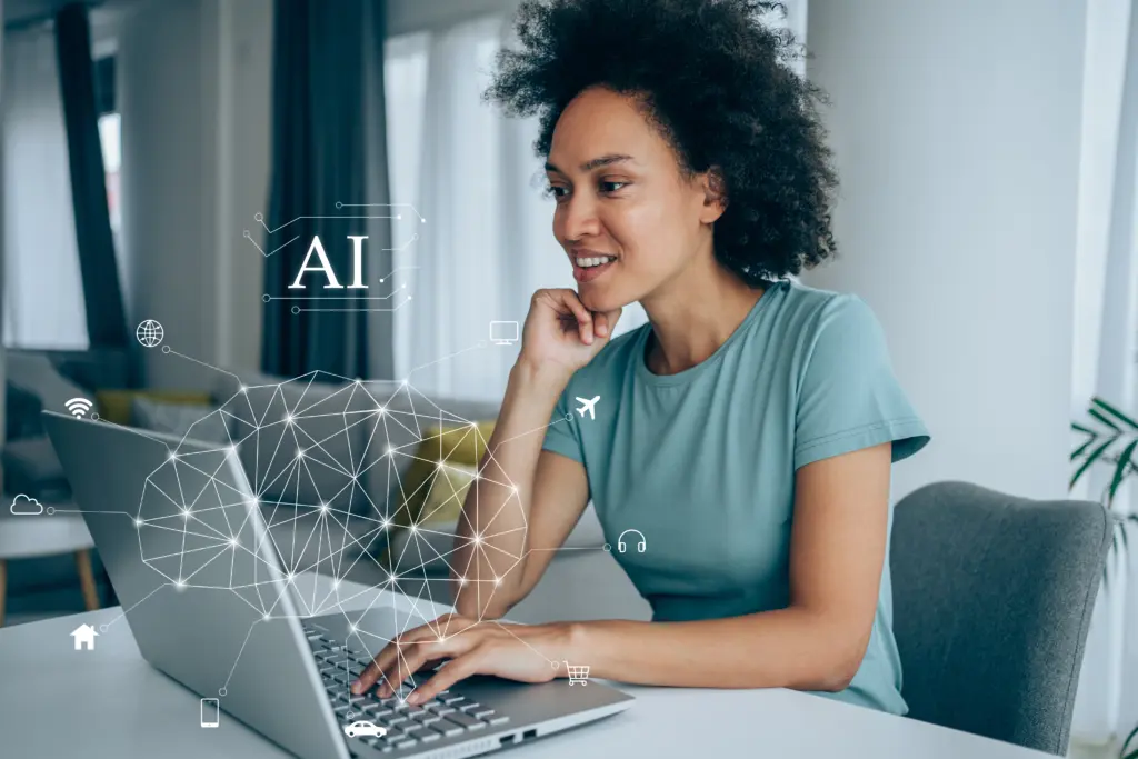 Woman at computer enjoying her online experience as an employee.